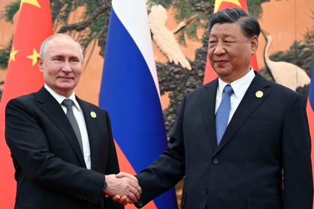 Ο Κινέζος πρόεδρος Σι Τζινπίνγκ και ο Ρώσος πρόεδρος Βλαντιμίρ Πούτιν