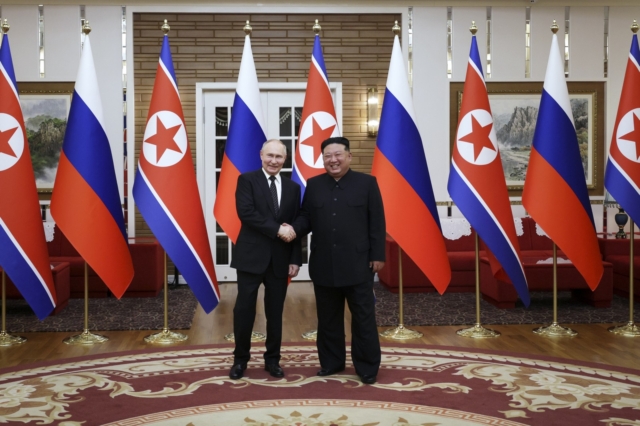 Κιμ Γιονγκ Ουν και Βλαντίμιρ Πούτιν
