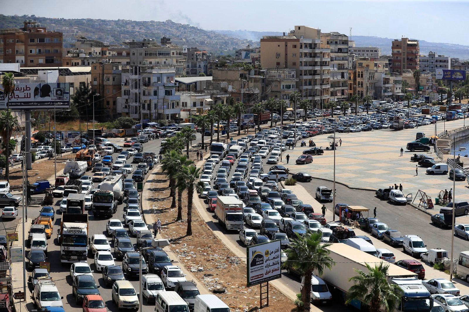 Cars are stuck in traffic jams as residents flee southern villages amid Israeli airstrikes.