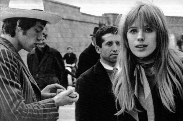 British singers Mike Jagger and Marianne Faithfull, in Sanremo’s harbour before boarding the yacht on Jan. 28, 1967. (AP Photo)